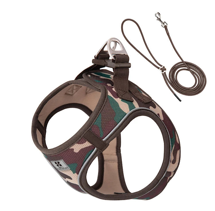 Camouflage-patterned dog harness with a leash on a white background